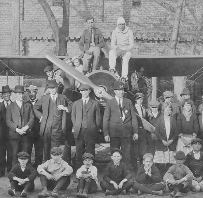 1923.XX.XX Redfern and One of his Flying Partners are shown atop Redfern's Curtis Jenny during a Barnstorming Event in Le~1 (Courtesy Paul Redfern Family.jpg